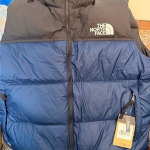 The North Face Blue and Black Puffer Vest
